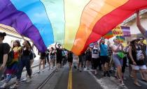 <p>Participants attend the 17th Gay Pride Parade in downtown Zagreb, Croatia, on June 9, 2018. (Photo: Stringer/AFP/Getty Images) </p>