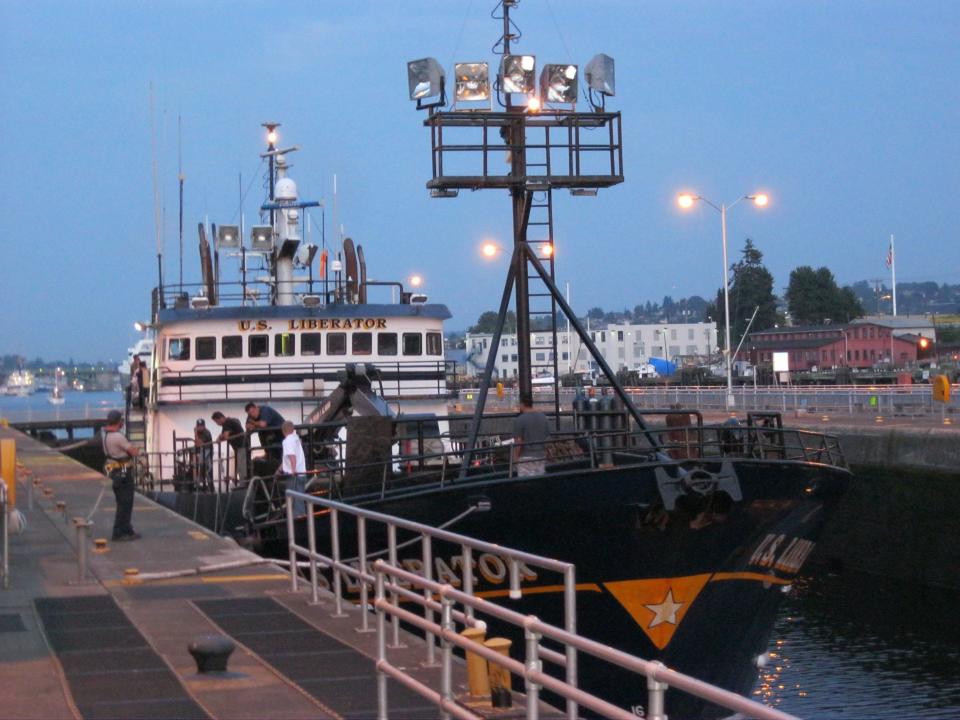 Big ship navigates the Chittenden Locks, headed out into Elliott Bay.