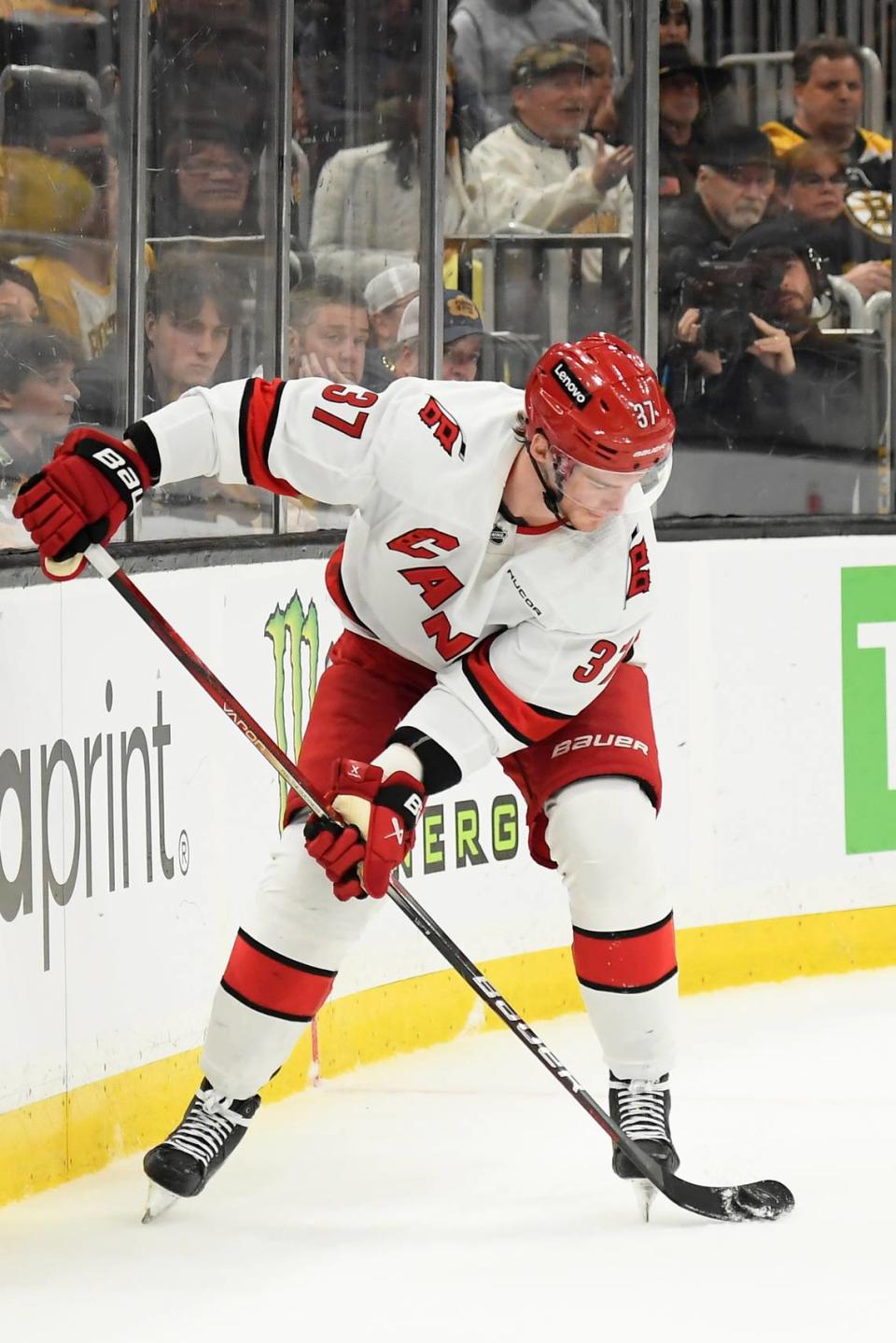 Apr 9, 2024; Boston, Massachusetts, USA; Carolina Hurricanes right wing Andrei Svechnikov (37) flips the puck on the blade of his stick prior to scoring a goal during the second period against the Boston Bruins at TD Garden. Mandatory Credit: Bob DeChiara-USA TODAY Sports