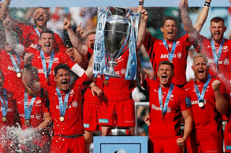 FILE PHOTO: Saracens celebrate winning their fourth Premiership title in five years after beating Exeter Chiefs 37-34 in a nail-biting final at Twickenham.