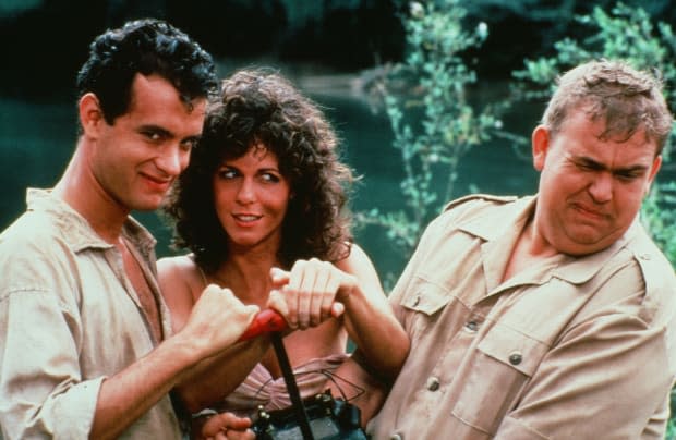 Tom Hanks, Rita Wilson and John Candy pose for the TriStar Pictures movie "Volunteers" in 1984.<p><a href="https://www.gettyimages.com/detail/502871185" rel="nofollow noopener" target="_blank" data-ylk="slk:Hulton Archive/Getty Images;elm:context_link;itc:0;sec:content-canvas" class="link ">Hulton Archive/Getty Images</a></p>