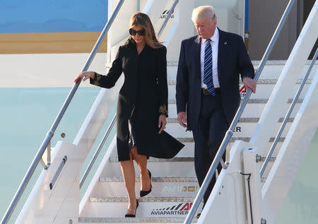 U.S. President Donald Trump and first lady Melania Trump arrive at the Leonardo da Vinci-Fiumicino Airport in Rome, Italy, May 23, 2017. REUTERS/Alessandro Bianchi