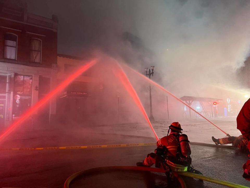 Firefighter defensively to control the fire at Harris Avenue over the weekend on Dec 17, 2023.