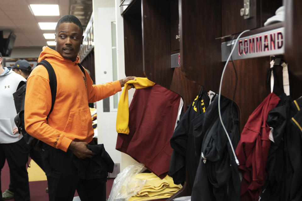 Washington Commanders wide receiver Terry McLaurin, packs his belongings from his locker during the NFL football team's open locker room event in Ashburn, Va., Monday, Jan. 9, 2023. The Commanders ended another season stuck in the middle of mediocrity at 8-8-1. (AP Photo/Manuel Balce Ceneta)