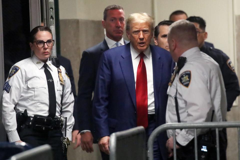 Former President Donald Trump arrives for a pre-trial hearing in a hash money case in criminal court on March 25, 2024 in New York City. Trump was charged with 34 counts of falsifying business records last year, which prosecutors say was an effort to hide a potential sex scandal. Judge Juan Merchan is expected to set a new start date for the trial after it was delayed following the disclosure of new documents in the case.