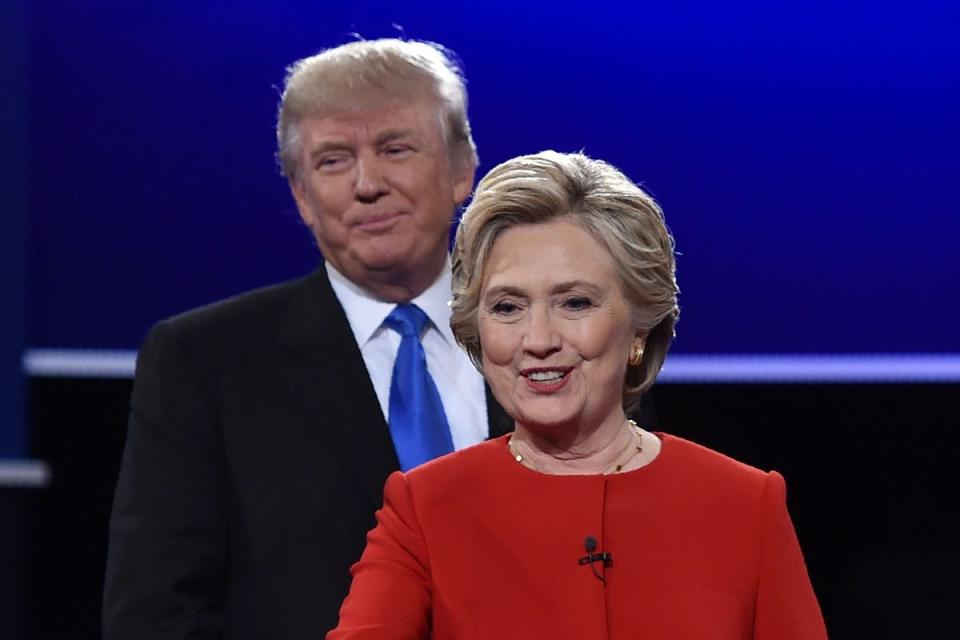 “It is a waste of time to try to refute Mr. Trump’s arguments like in a normal debate,” Clinton wrote in a new op-ed ahead of Thusday’s debate between Trump and Biden. She is pictured in a 2016 debate with Trump (AFP via Getty Images)