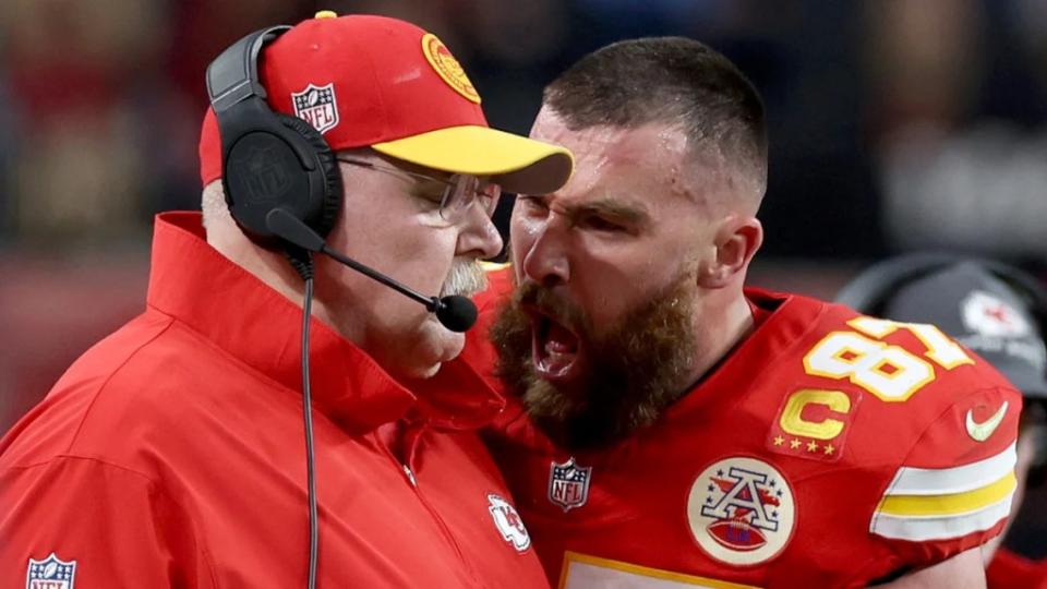 Travis Kelce yells at Chiefs head coach Andy Reid during the Super Bowl