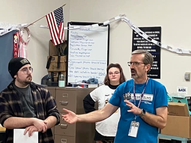 Davenport Central teacher Clint Balsar (right) works with Fresh Films students (photo by Jonathan Turner).