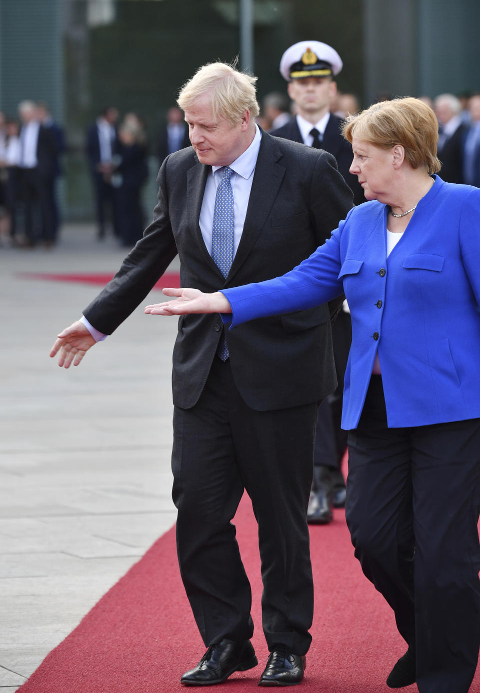 Germany's Chancellor Angela Merkel meets with British Prime Minister Boris Johnson, in Berlin, Wednesday, Aug. 21, 2019. German Chancellor Angela Merkel says she plans to discuss with UK Prime Minister Boris Johnson how Britain's exit from the European Union can be "as frictionless as possible." (Bernd Von Jutrczenka/dpa via AP)