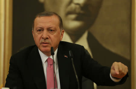 FILE PHOTO: Turkish President Tayyip Erdogan speaks during a news conference at Ataturk International Airport in Istanbul, Turkey September 8, 2017. REUTERS/Osman Orsal