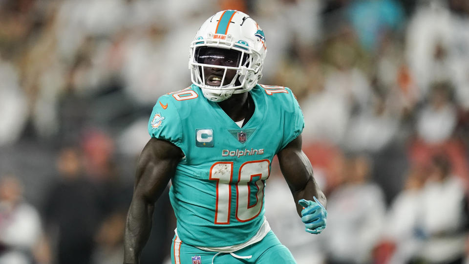 Miami Dolphins' Tyreek Hill (10) runs during the first half of an NFL football game against the Cincinnati Bengals, Thursday, Sept. 29, 2022, in Cincinnati. (AP Photo/Joshua A. Bickel)