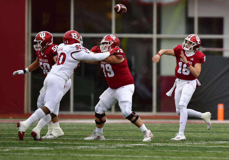 Nov 13, 2021; Bloomington, Indiana, USA; Indiana Hoosiers quarterback Grant Gremel (16) throws a pass late in the second half against the Rutgers Scarlet Knights at Memorial Stadium. The Scarlet Knights won 38-3. Mandatory Credit: Marc Lebryk-USA TODAY Sports