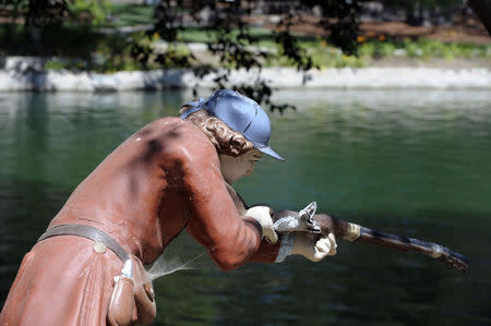 A statue stands near the main house inside Michael Jackson's Neverland Ranch in Los Olivos, California July 3, 2009. REUTERS/Phil Klein