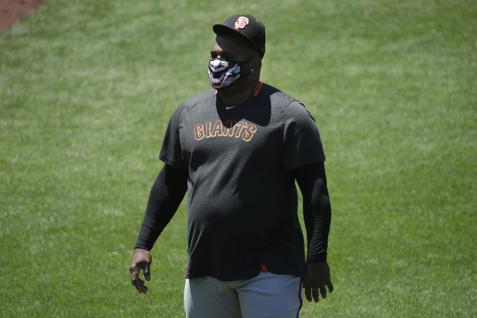 San Francisco Giants' Pablo Sandoval walks on the field during a baseball practice in San Francisco, Sunday, July 5, 2020. (AP Photo/Jeff Chiu)