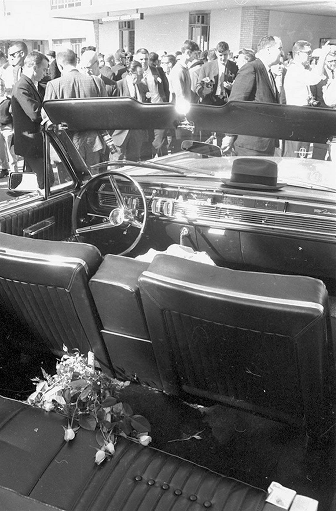 Nov. 22, 1963: The empty limousine with flowers on the back seat outside Parkland Hospital following the President John F. Kennedy assassination.