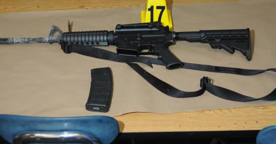 A Bushmaster rifle belonging to Sandy Hook Elementary school gunman Adam Lanza in Newtown, Connecticut is seen after its recovery at the school in this police evidence photo released by the state's attorney's office November 25, 2013. A long-awaited state's attorney report on Monday on one of the worst mass shootings in the United States revealed few new details and left relatives of 20 children and six adults killed with no more knowledge about Lanza's motive. REUTERS/Connecticut Department of Justice/Handout via Reuters (UNITED STATES - Tags: CRIME LAW) ATTENTION EDITORS - THIS IMAGE WAS PROVIDED BY A THIRD PARTY. FOR EDITORIAL USE ONLY. NOT FOR SALE FOR MARKETING OR ADVERTISING CAMPAIGNS. THIS PICTURE IS DISTRIBUTED EXACTLY AS RECEIVED BY REUTERS, AS A SERVICE TO CLIENTS