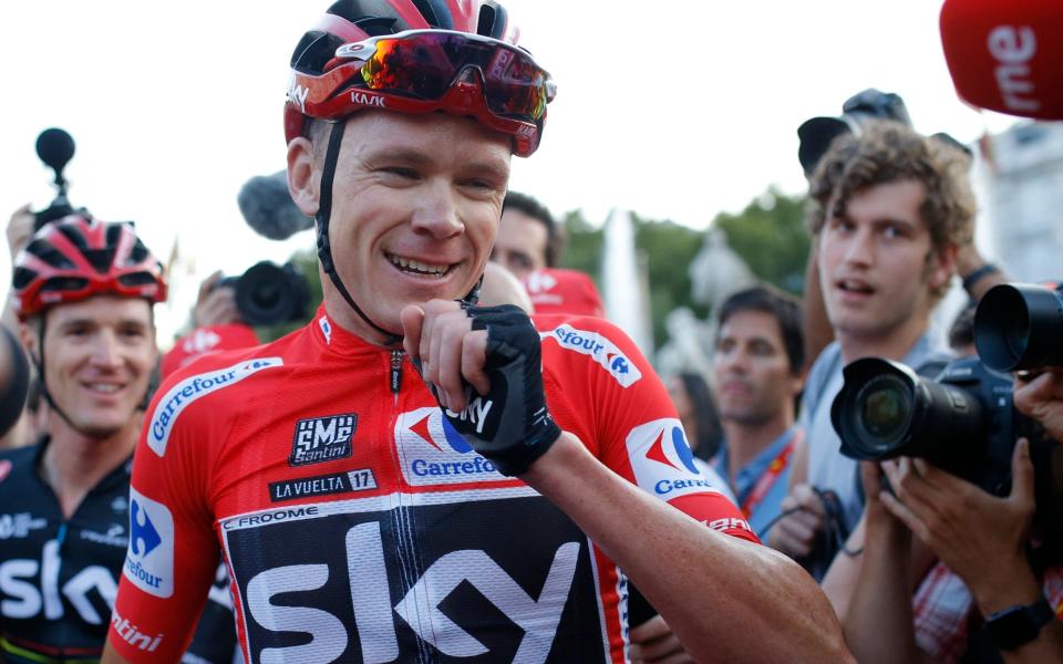 Chris Froome rejoices after winning the Vuelta - AP