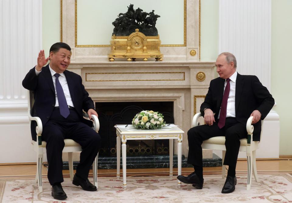 FILE - Chinese President Xi Jinping gestures while speaking to Russian President Vladimir Putin during their meeting at the Kremlin in Moscow, Russia, on March 20, 2023. Asia’s stake in Europe’s war was made crystal clear Tuesday when the leaders of the region's two richest countries sat in the capitals of Russia and Ukraine in strong shows of support for the opposing sides. (Sergei Karpukhin, Sputnik, Kremlin Pool Photo via AP, File)