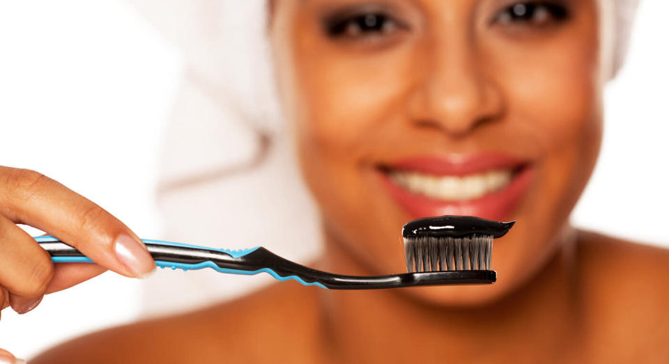 Charcoal toothpaste could be harming your teeth. [Photo: Getty]