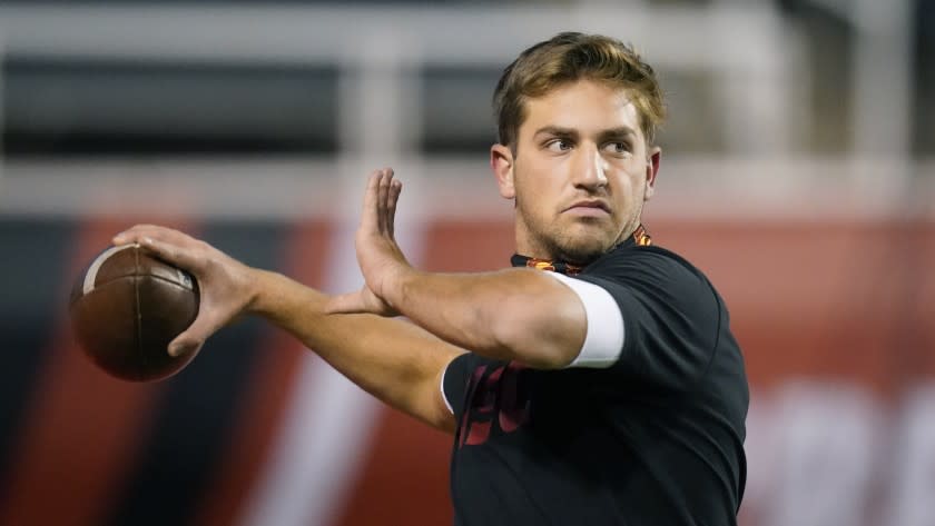 Southern California quarterback Kedon Slovis warms up before the team's NCAA college football game against Utah on Saturday, Nov. 21, 2020, in Salt Lake City. (AP Photo/Rick Bowmer)