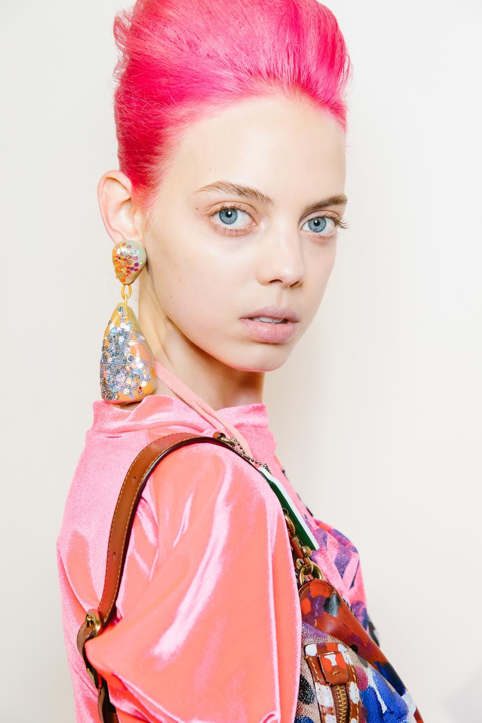 London Fashion Week’s rising designers are sending models down the runway with punky, multicolored hair and rainbow party wigs.