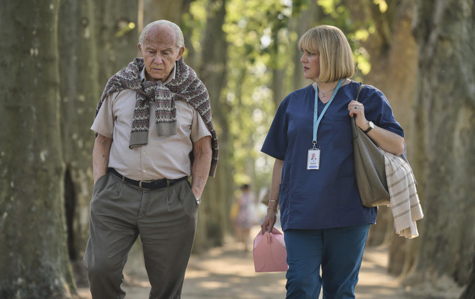 Harvey Keitel as Lali Sokolov and Melanie Lynskey as Heather Morris walking through the streets of Melbourne.