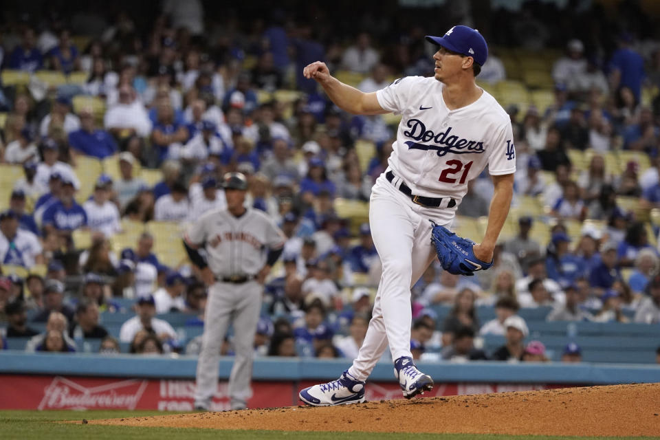 Los Angeles Dodgers starting pitcher Walker Buehler throws to the San Francisco Giants during the second inning of a baseball game Thursday, July 22, 2021, in Los Angeles. (AP Photo/Marcio Jose Sanchez)