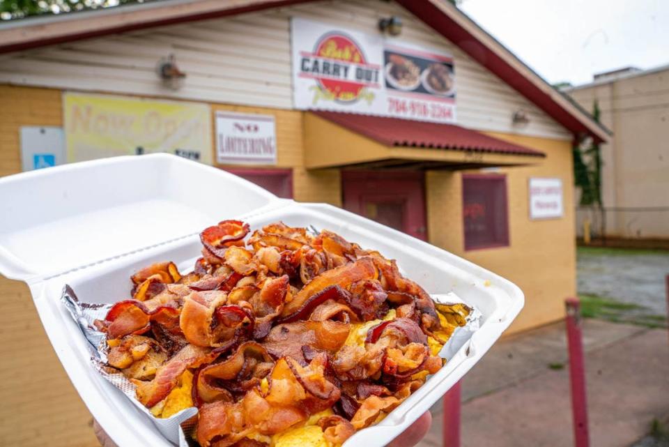 The breakfast platter with bacon at Bob’s Carry Out Pile ‘Em Up.