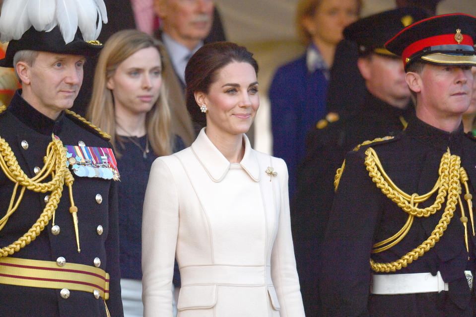 The Duchess of Cambridge watches members of the Massed Bands of the Household Division during the annual Beating Retreat ceremony, which features over 750 soldiers, on Horse Guards Parade, London.