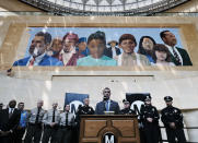 The Transportation Security Administration (TSA) administrator David P. Pekoske, center, talks during a news conference in Los Angeles' Union Station on Tuesday, Aug. 14, 2018. Pekoske talked about the ThruVision suicide vest-detection technology that reveals suspicious objects. Aiming to stay ahead of an evolving threat against transit systems worldwide, officials in Los Angeles are testing out the airport-style body scanners that screen subway passengers for weapons and explosives. (AP Photo/Richard Vogel)