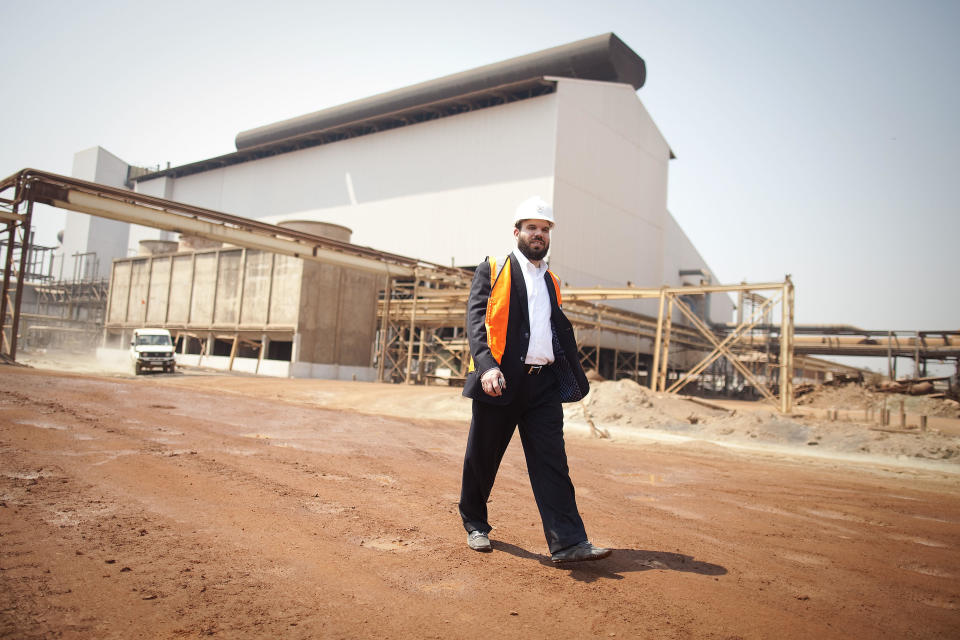 Israeli billionaire Dan Gertler walks through the Katanga Mining Ltd. copper and cobalt mine complex during a tour of the operations in Kolwezi, Democratic Republic of Congo, on Aug. 1, 2012.  / Credit: Simon Dawson/Bloomberg via Getty Images