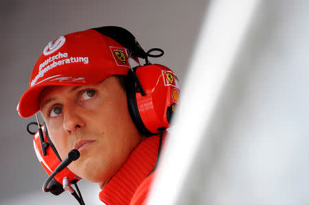 FILE PHOTO: Former Ferrari driver Michael Schumacher of Germany looks on during the qualifying session for the Italian F1 Grand Prix race at the Monza racetrack in Monza, near Milan, in this September 13, 2008 file photo. REUTERS/Alessandro Bianchi/File Photo