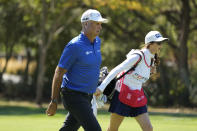 Stewart Cink walks up the third fairway with his with his wife and caddie Lisa Cink, during the first round of the Fortinet Championship PGA golf tournament at the Silverado Resort North Course in Napa, Calif., Thursday, Sept. 14, 2023. (AP Photo/Eric Risberg)