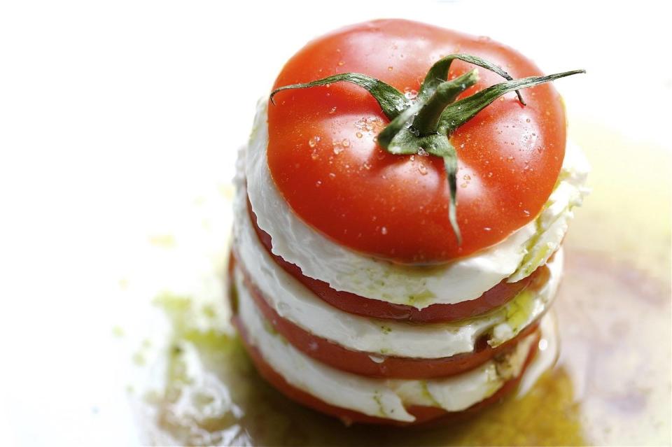 A caprese salad is a simple Italian dish made from fresh tomatoes and mozzarella cheese. (Photo: Amarone Kitchen and Wine)