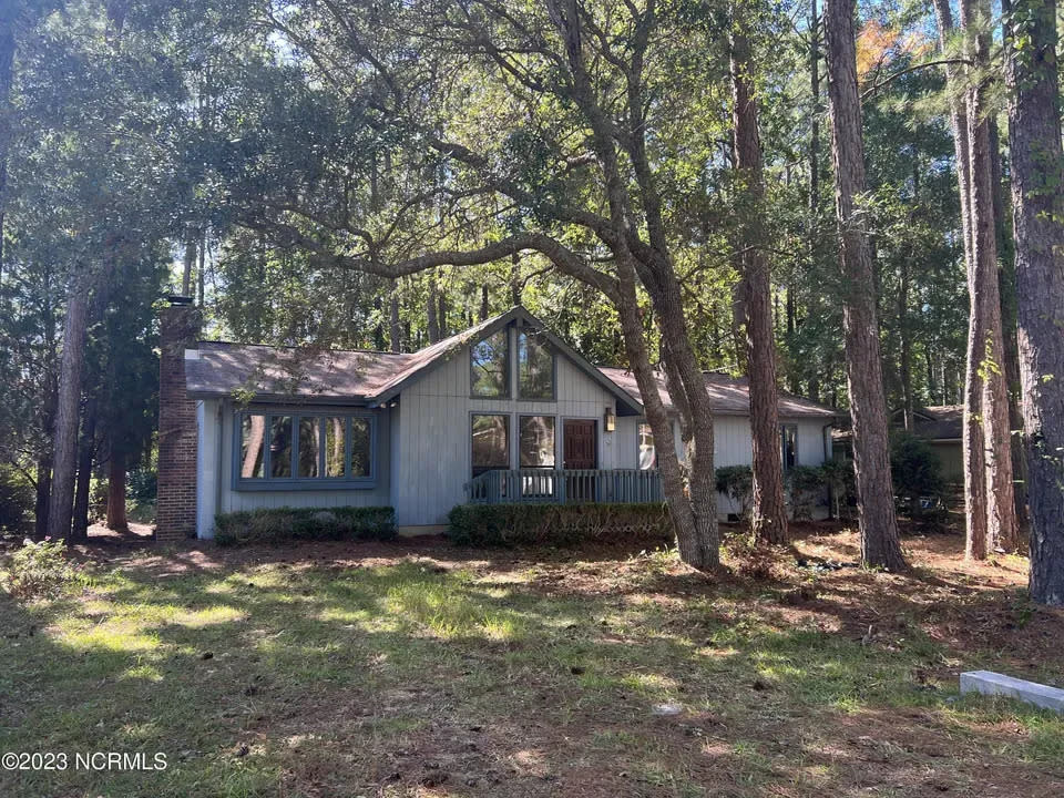 This house listed for sale is located at 9 E. Pine Court in Carolina Shores, N.C.