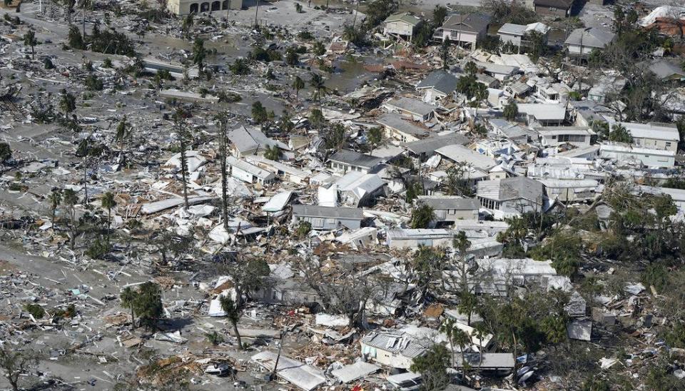 Damaged homes and debris are shown in the aftermath of Hurricane Ian in Fort Myers Beach