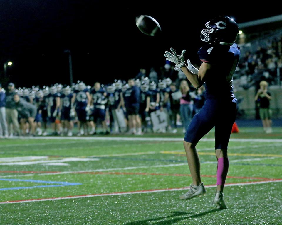Cohasset's Shane Mulcahy is wide open for an easy touchdown reception to give Cohasset the 36-6 during third quarter action of their game at Cohasset Middle High School on Friday, Oct. 27, 2023. Cohasset would go on to win 43-6.
