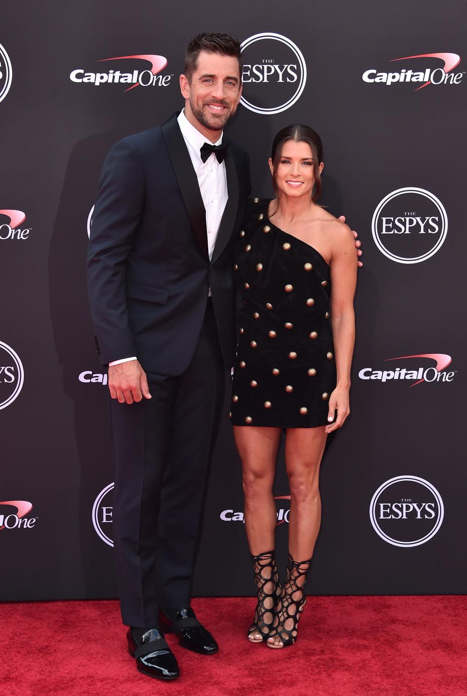 Aaron Rodgers and host Danica Patrick attend the 2018 ESPYS in July in Los Angeles.