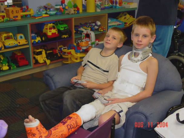 PHOTO: Cody Kimball visits Justin Kimball in the hospital in 2004. (Courtesy of Justin Kimball family)