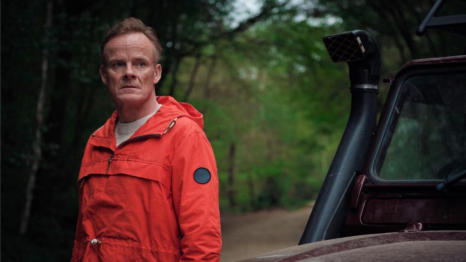 Rob (Alistair Petrie) in an orange jumpsuit in The Following Events Are Based On A Pack Of Lies