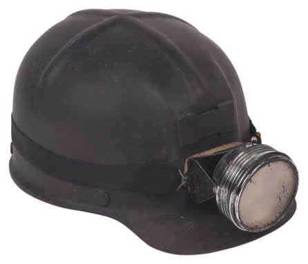 old mining hardhat with head light