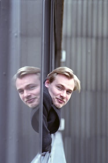 Film director Christopher Nolan, after author Tom Shone first met him in 2000 on the eve of Memento's release. From the book "The Nolan Variations: The Movies, Mysteries, and Marvels of Christopher Nolan" by Tom Shone. Photographed in his hotel room in New York City on 12th December 2000. His new film, 'Memento,' will be released in New York in March. ( Film director Christopher Nolan, photographed in his hotel room in New York City on 12th December 2000. His new film, 'Memento,' will be released in New York in March. (Photo by Barbara Alper/Getty Images)