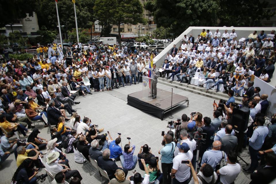 Opposition leader and self-proclaimed interim president of Venezuela Juan Guaido speaks during a protest asking for the freedom of opposition lawmaker Juan Requesens, in Caracas, Venezuela, Wednesday, Aug. 7, 2019. Requesens has spent a year in prison and is accused in an assassination attempt on President Nicolas Maduro. (AP Photo/Ariana Cubillos)