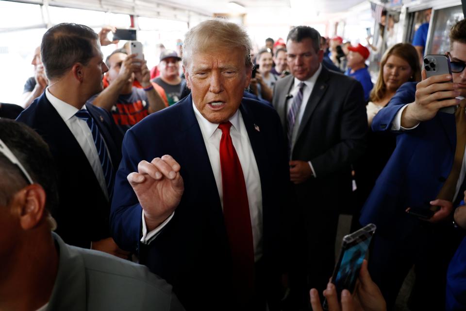 Republican presidential candidate, former U.S. President Donald Trump greets supporters at sandwich stop Tony and Nick's steaks on June 22, 2024 in Philadelphia, Pennsylvania.