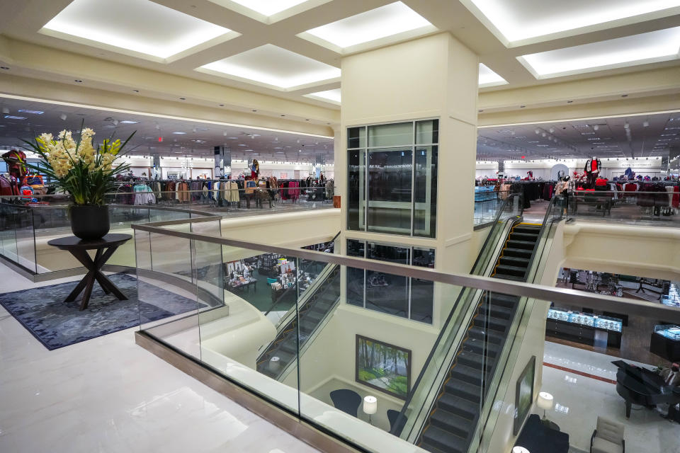 The elevator sits near the escalators at the new Von Maur location in the Jordan Creek Town Center in West Des Moines.