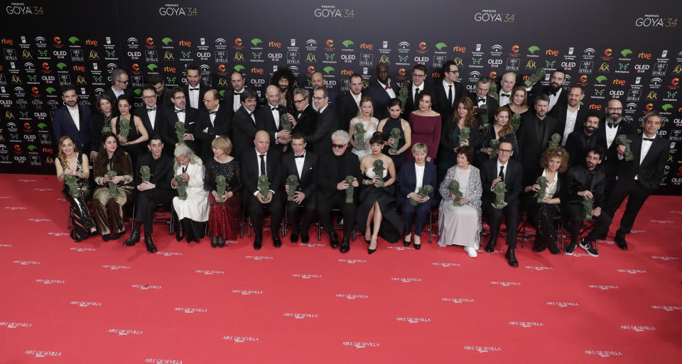 Goya Film Awards winners pose with their trophies for a family photo at the end of the Goya Film Awards Ceremony in Malaga, southern Spain, early Sunday, Jan. 26, 2020. The annual Goya Awards are Spain's main national film awards. (AP Photo/Manu Fernandez)