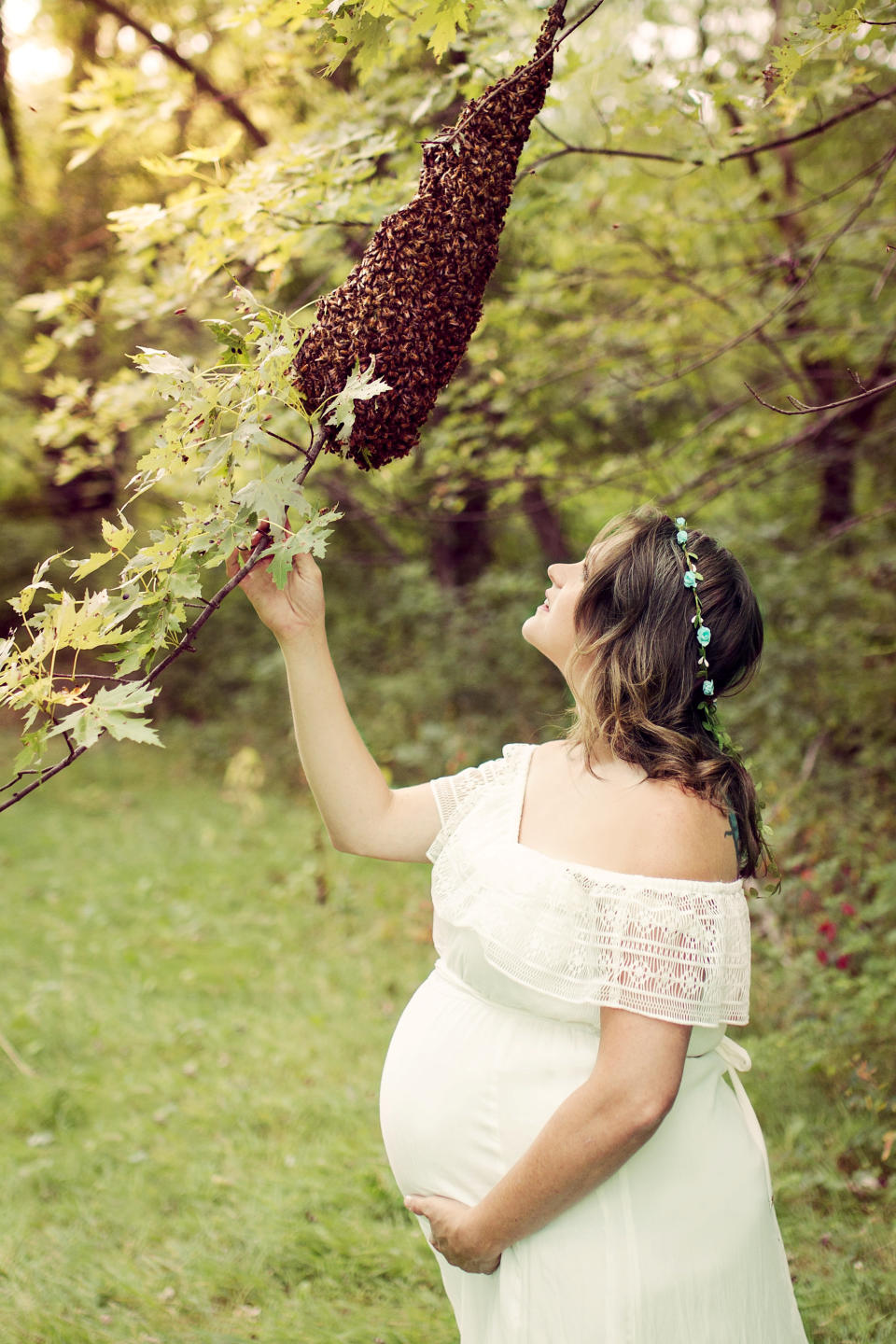 <p>“I had been called to a swarm removal that morning, so I fed those bees sugar to make sure they would be content and gentle enough to work with,” says Mueller. (Photo: SWNS) </p>