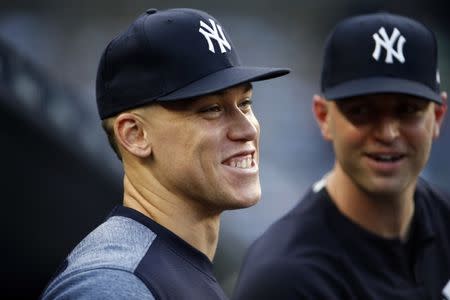 Aug 15, 2018; Bronx, NY, USA; New York Yankees right fielder Aaron Judge (99) looks on against the Tampa Bay Rays during the first inning at Yankee Stadium. Mandatory Credit: Adam Hunger-USA TODAY Sports