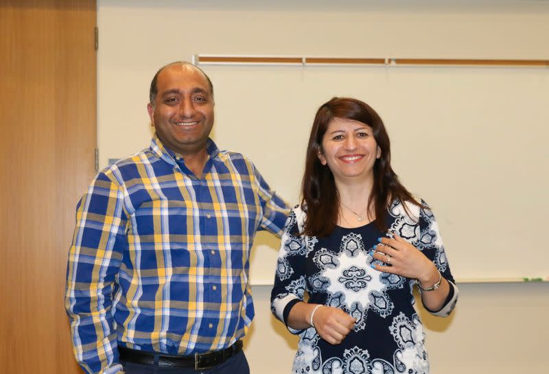 University of Alberta professors Mojgan Daneshmand and Pedram Mousavi pose in an undated family photo