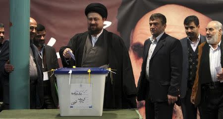 Hassan Khomeini, a grandson of the Islamic Republic founder Ayatollah Ruhollah Khomeini, casts his ballot in a parliamentary election in Tehran in this March 2, 2012 file photo. REUTERS/Stringer/Files